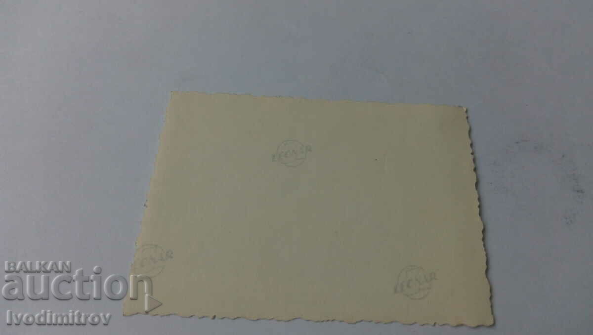 Photo Young man and four girls on the street with price 1.25 BGN | € 0.64 Photo Young man and four girls on the street with price 1.25 BGN | € 0.64