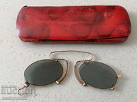 Old pince-nez glasses with binoculars