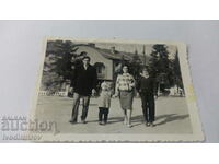 Photo Belovo Man woman and two children on a walk 1964
