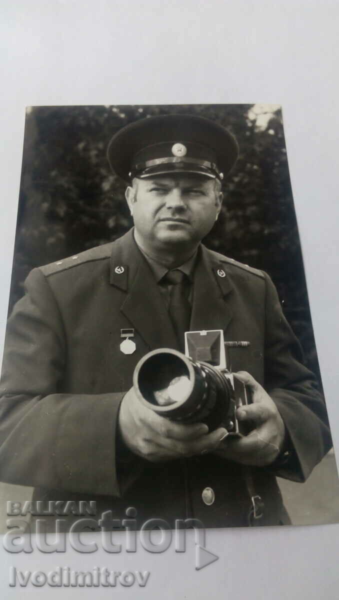 Photo Officer with retro camera