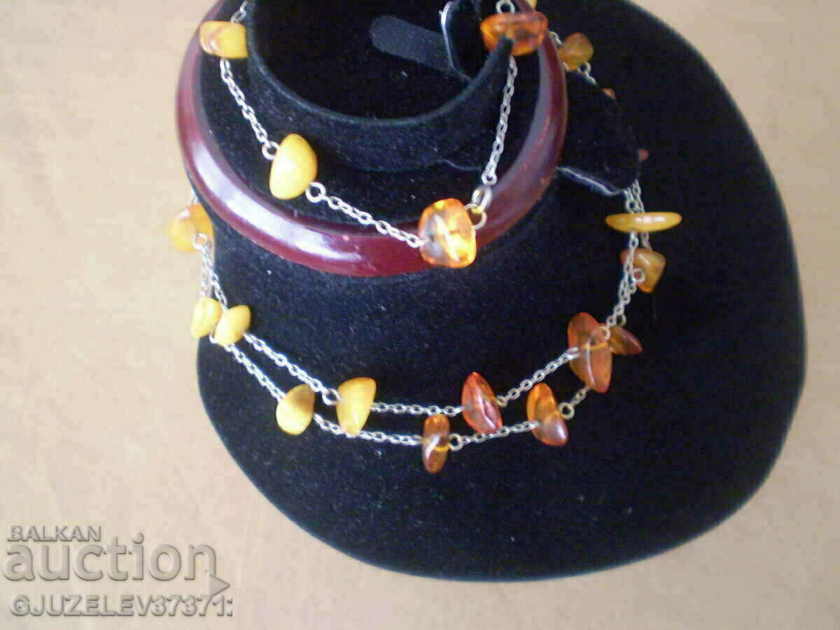 Auction Women's set of necklace and bracelet made of natural tiles Auction Women's set of necklace and bracelet made of natural tiles