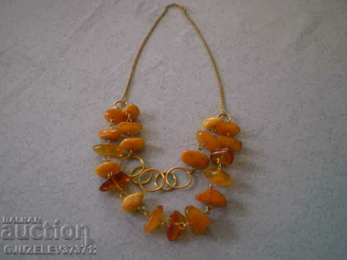 USSR amber necklace with gilding with price 1220.00 BGN | € 623.78 USSR amber necklace with gilding with price 1220.00 BGN | € 623.78