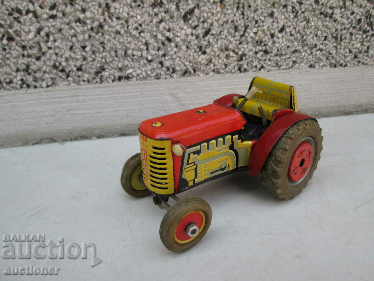 OLD CHILDREN'S PLATE TOY TRACTOR