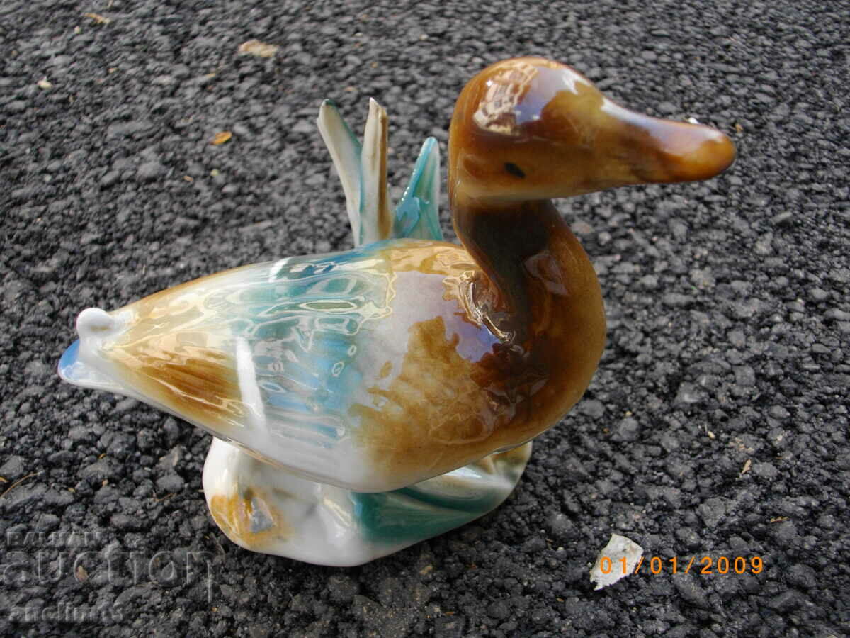Delivery of OLD PORCELAIN DUCK MARKED