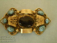 antique stone brooch of the turquoise type
