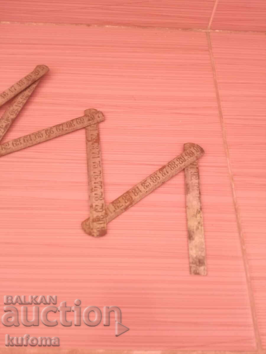 Auction Old iron folding meter Auction Old iron folding meter