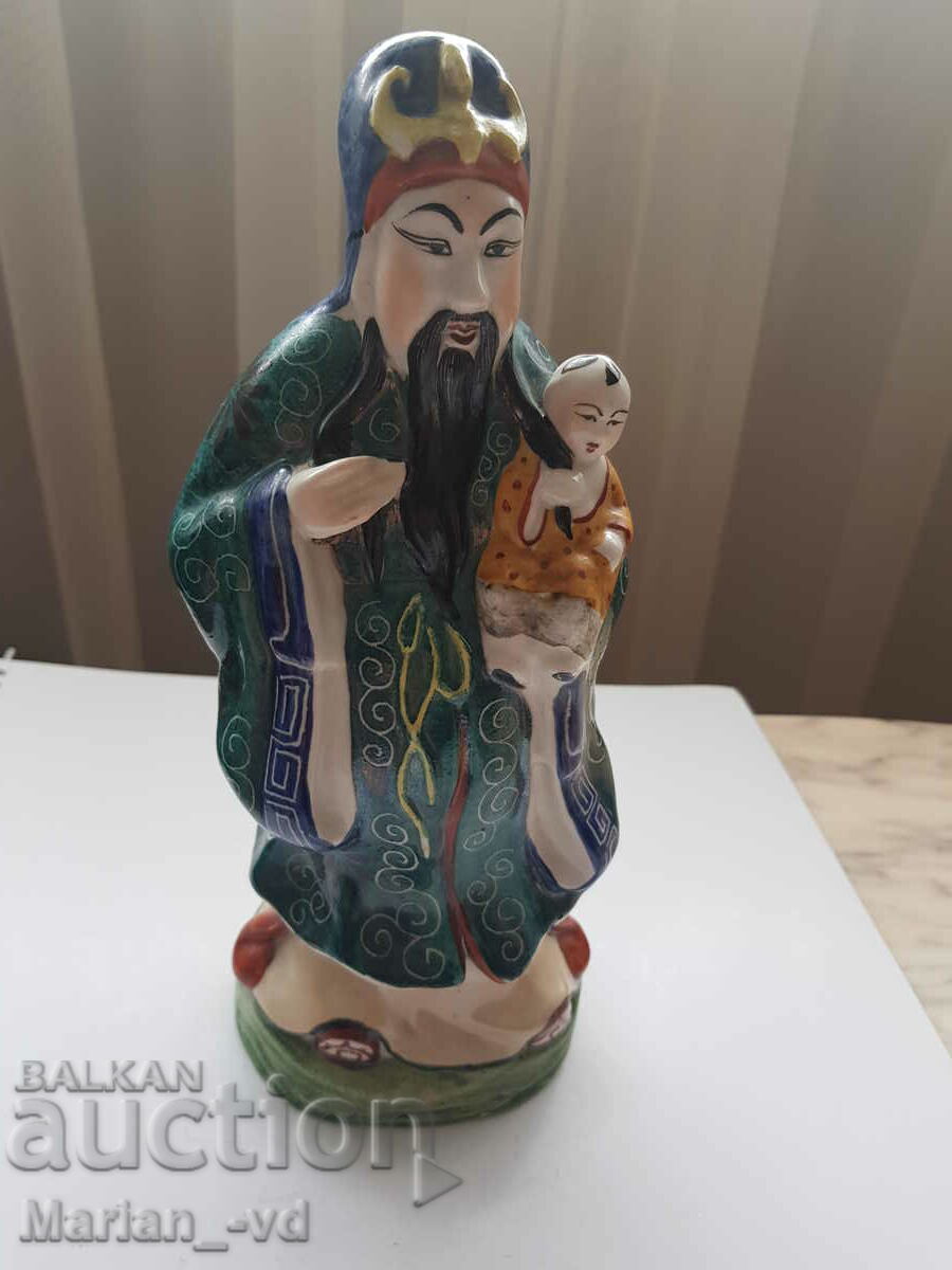 An old Chinese porcelain figure