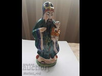 An old Chinese porcelain figure