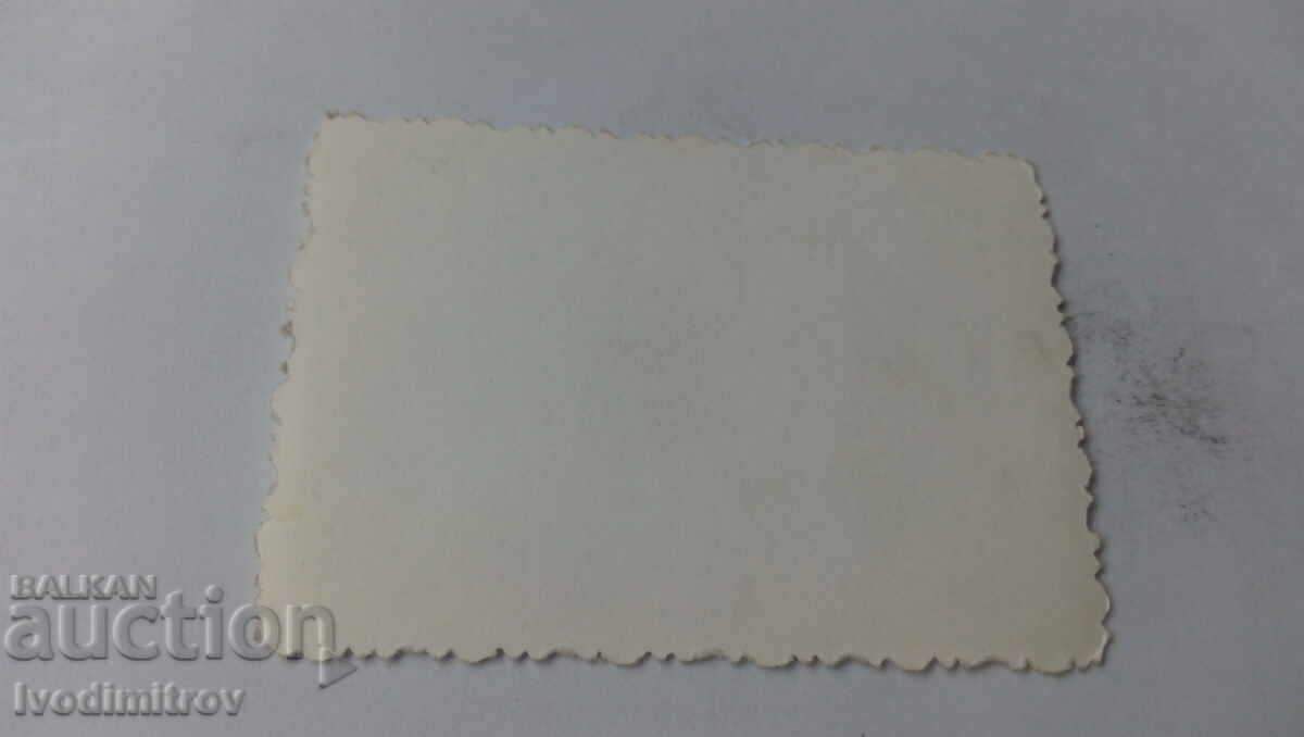 Photo of a man and a boy in a fight on the lawn with price 2.35 BGN | € 1.20 Photo of a man and a boy in a fight on the lawn with price 2.35 BGN | € 1.20