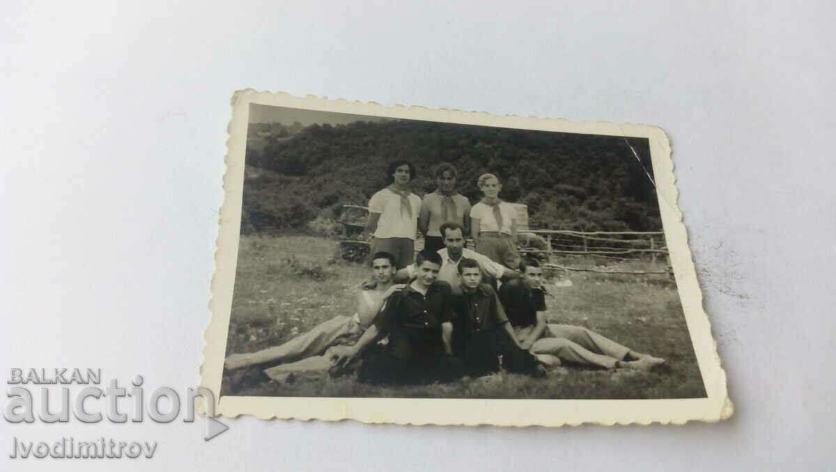 Photo Young men and women on the meadow 1957