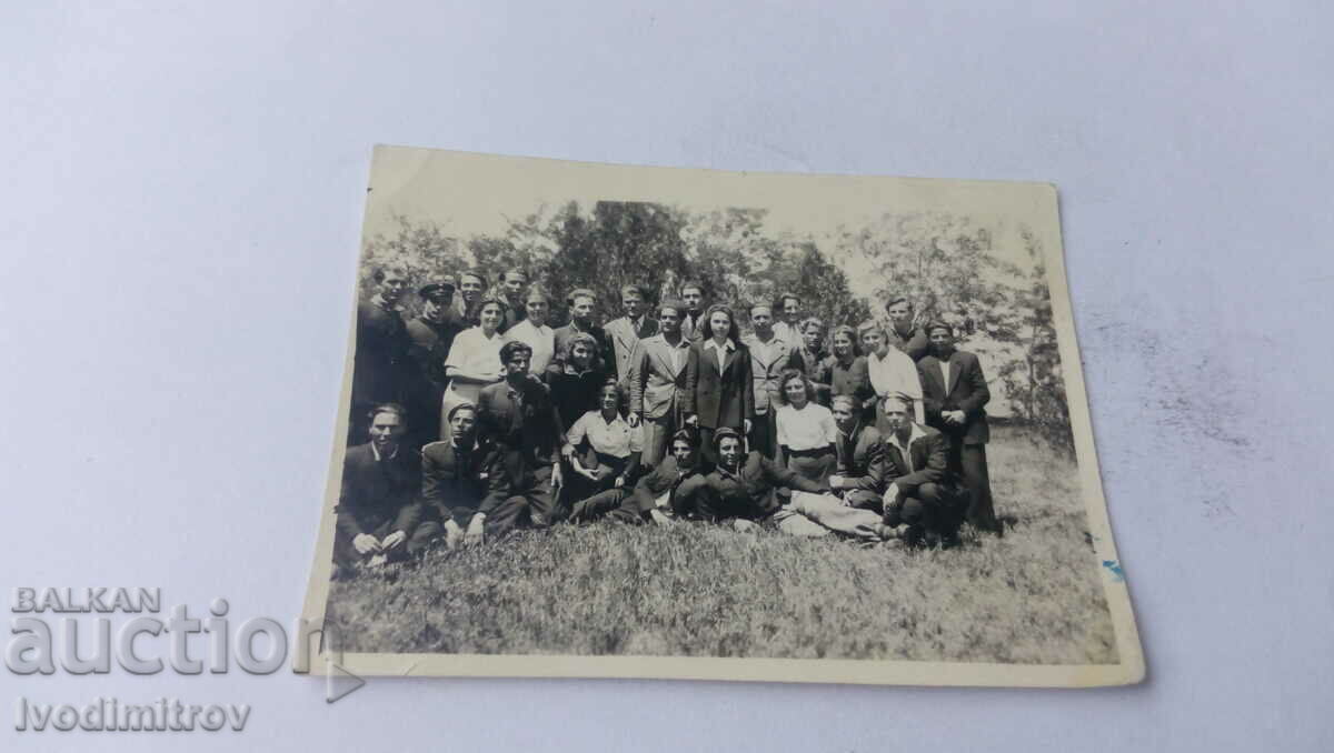 Photo Students with their teacher on the lawn 1945