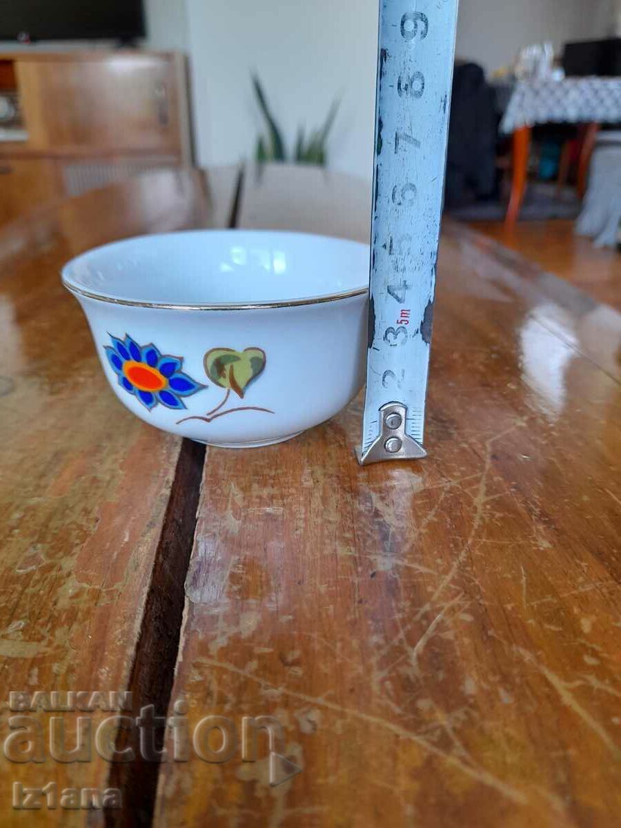 Livrarea ceașcă veche de porțelan