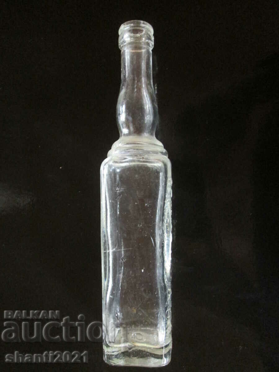 Sticla veche de sticla cu inscriptii arabe