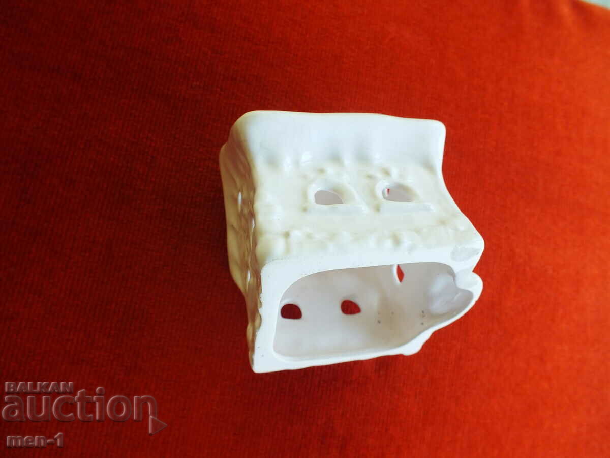 Auction An old porcelain figure Auction An old porcelain figure