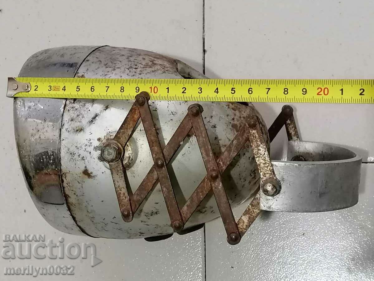 Delivery of Old headlight from motorcycle, automobile, car