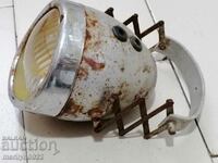 Old headlight from motorcycle, automobile, car