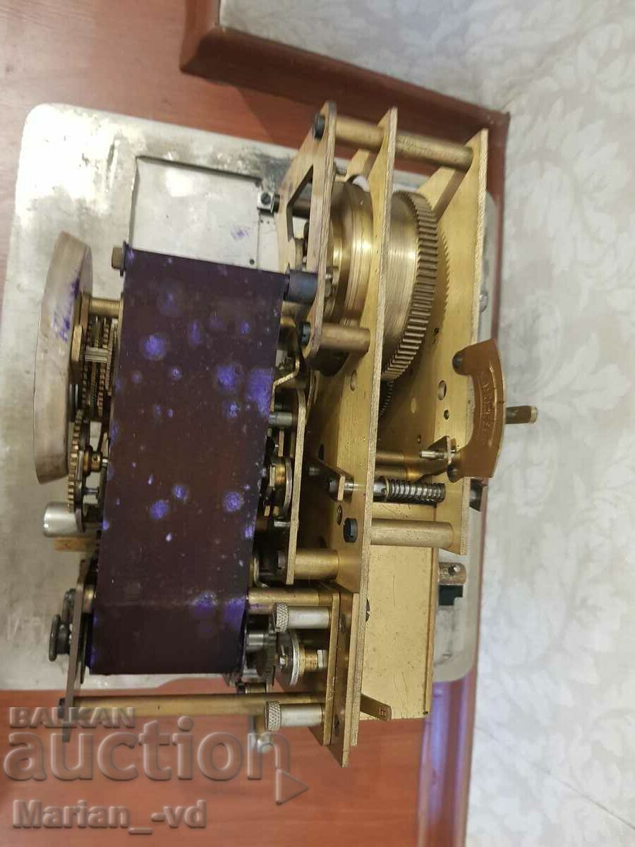 Delivery of Old machine for attendance at a factory with a watch