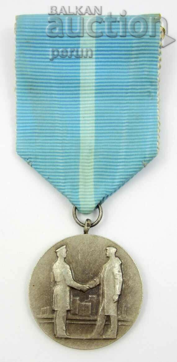 Communism-Medal-For voluntary work in favor of socialism