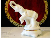 Porcelain salt shaker, Elephant figure, gold.