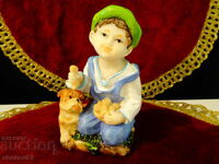 German statuette Child with a dog.