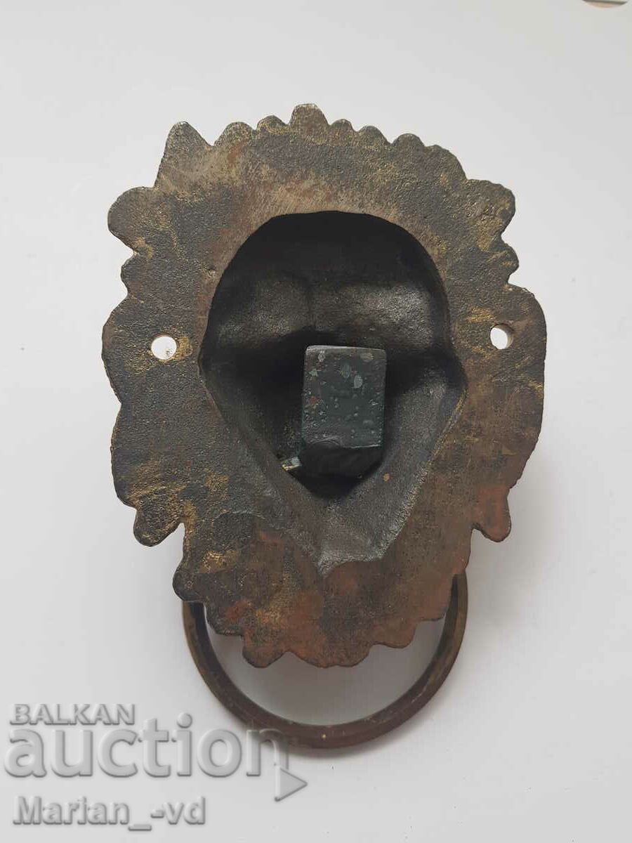Auction Old metal door knocker Auction Old metal door knocker