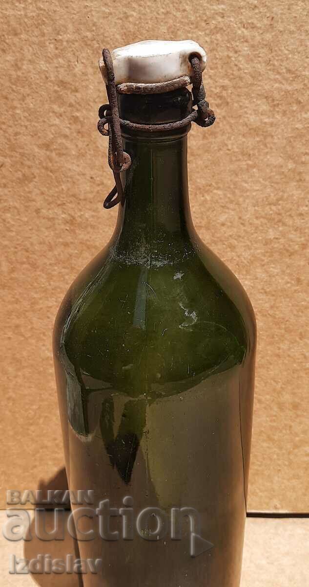 Auction Antique glass bottle with porcelain cap Auction Antique glass bottle with porcelain cap