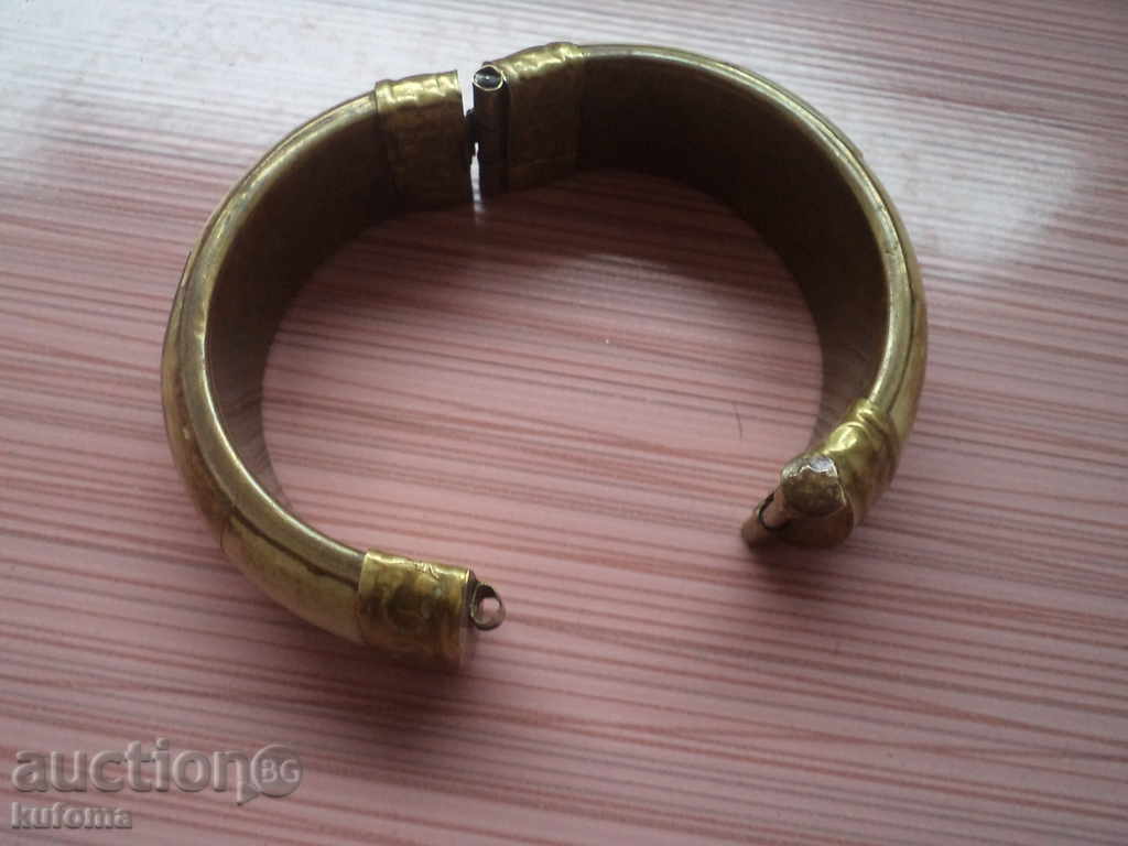 Auction Old bracelet made of brass and ivory Auction Old bracelet made of brass and ivory