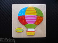 Wooden bubble puzzle for the smallest toy flying helium kids
