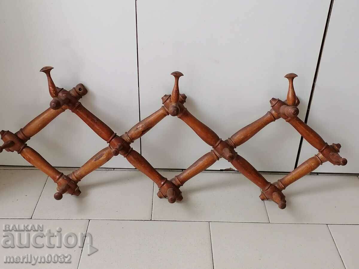 Old extendable turned wooden hanger, wooden