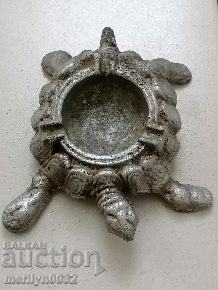 Antique ashtray with brass figure