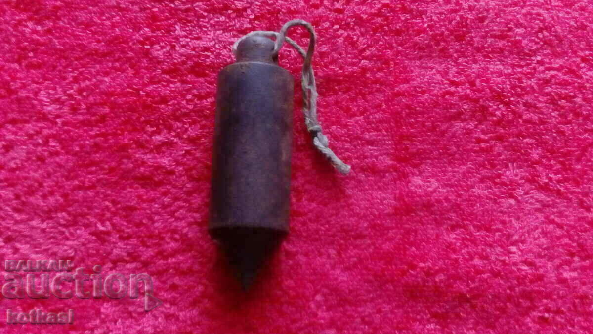 Old metal iron plumb line