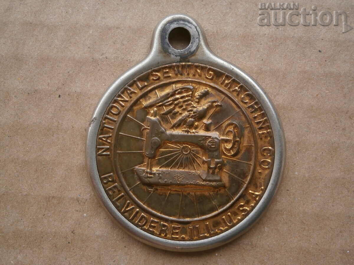 Old plate from a sewing machine USA emblem - 5 Old plate from a sewing machine USA emblem - 5