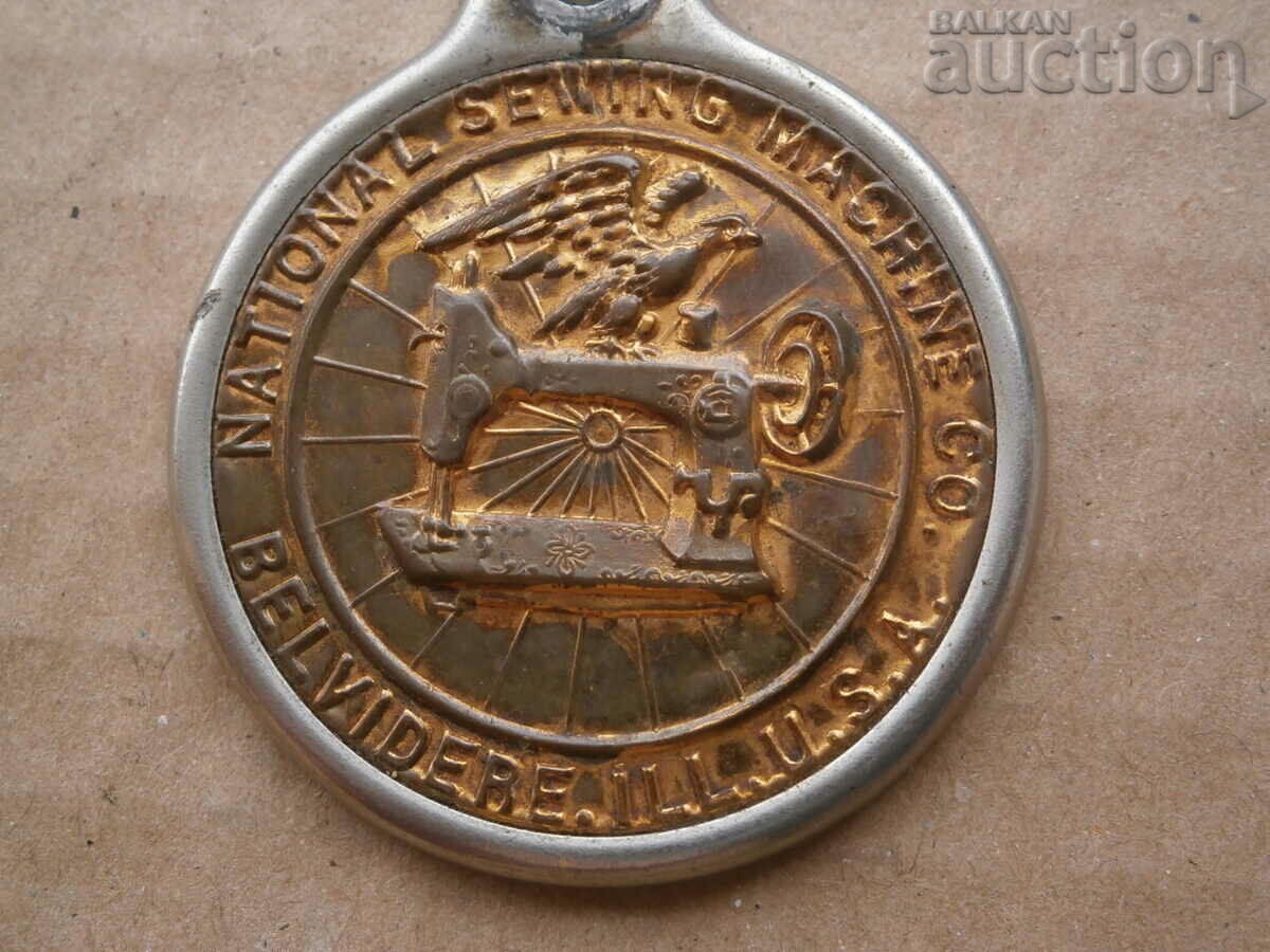 Old plate from a sewing machine USA emblem - 6 Old plate from a sewing machine USA emblem - 6