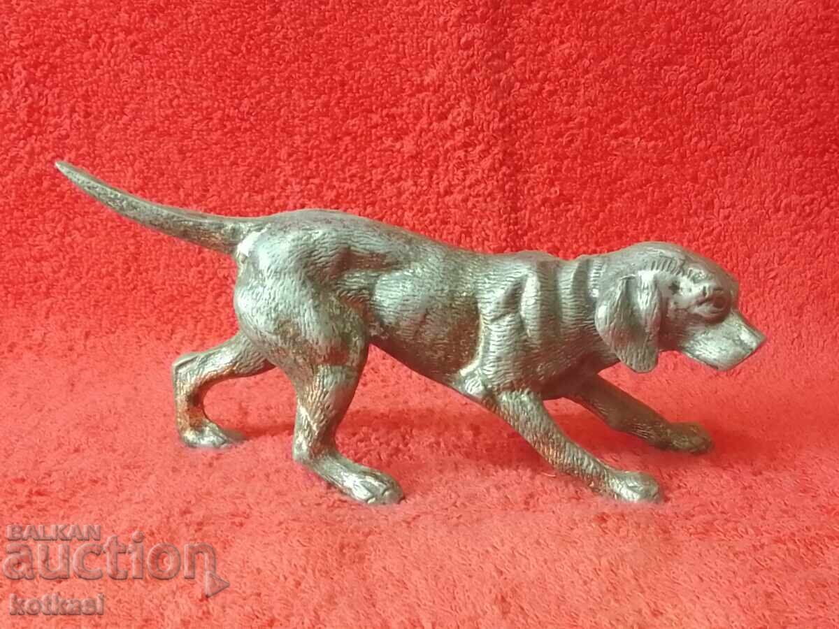 Old metal figure of a hunting dog Old metal figure of a hunting dog