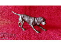 Old metal figure of a hunting dog