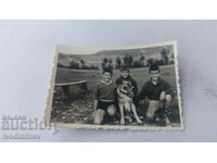 Photo Madjare Three boys and a wolf dog 1963