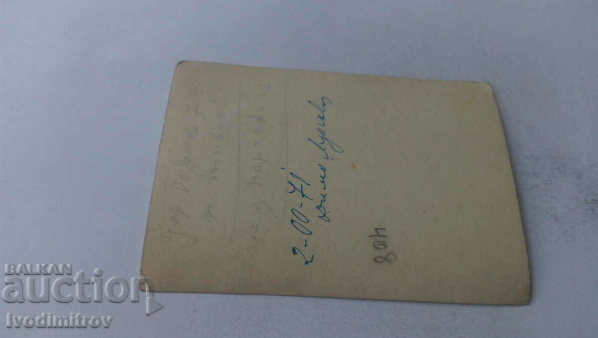 Photo of a woman in a black swimsuit on the beach with price 2.35 BGN | € 1.20 Photo of a woman in a black swimsuit on the beach with price 2.35 BGN | € 1.20