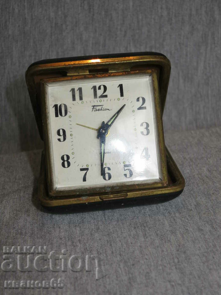 old tourist alarm clock