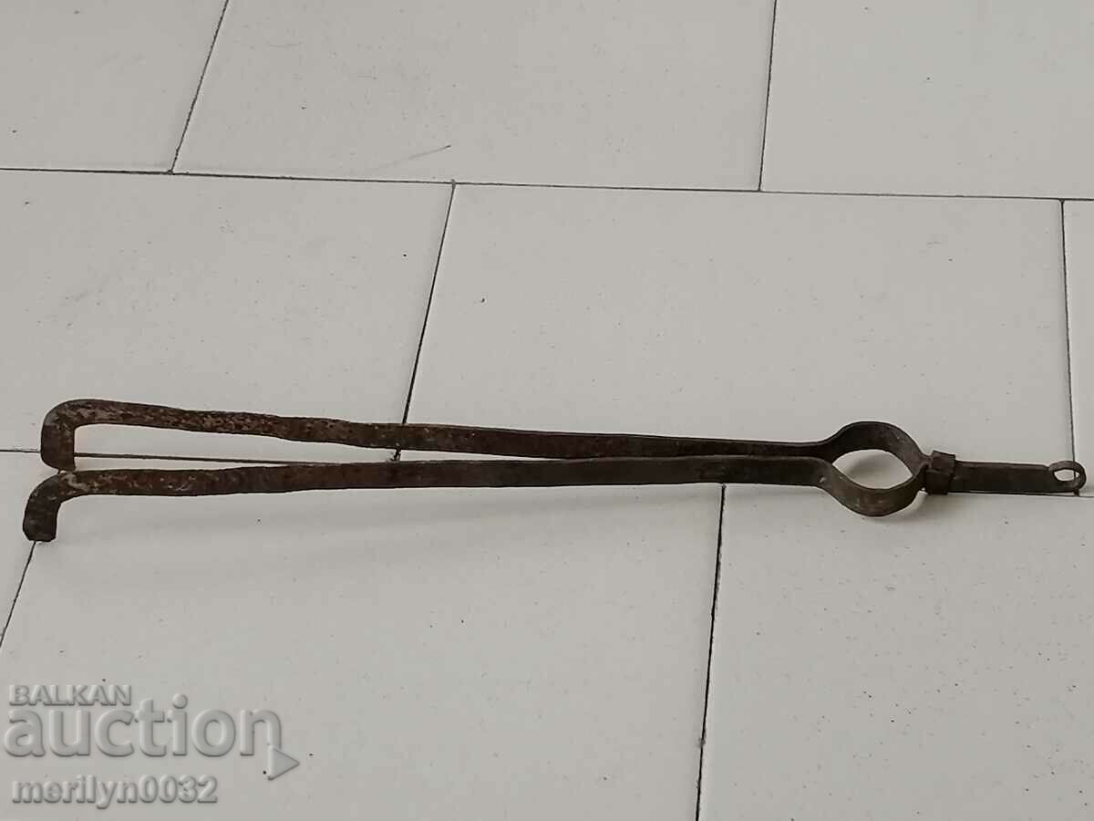 Old dilaf, tongs, wrought iron for oven