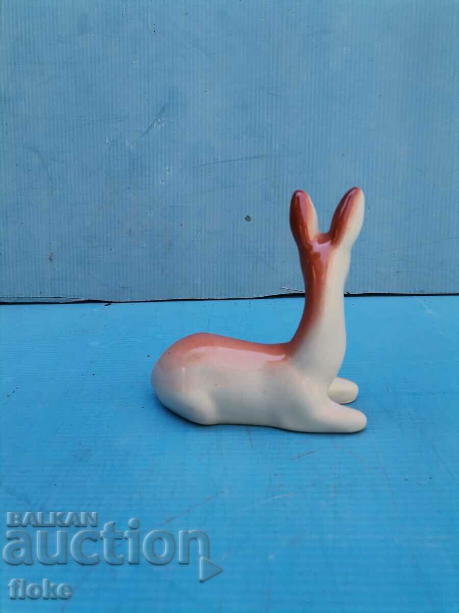 Delivery of An old porcelain statuette Delivery of An old porcelain statuette