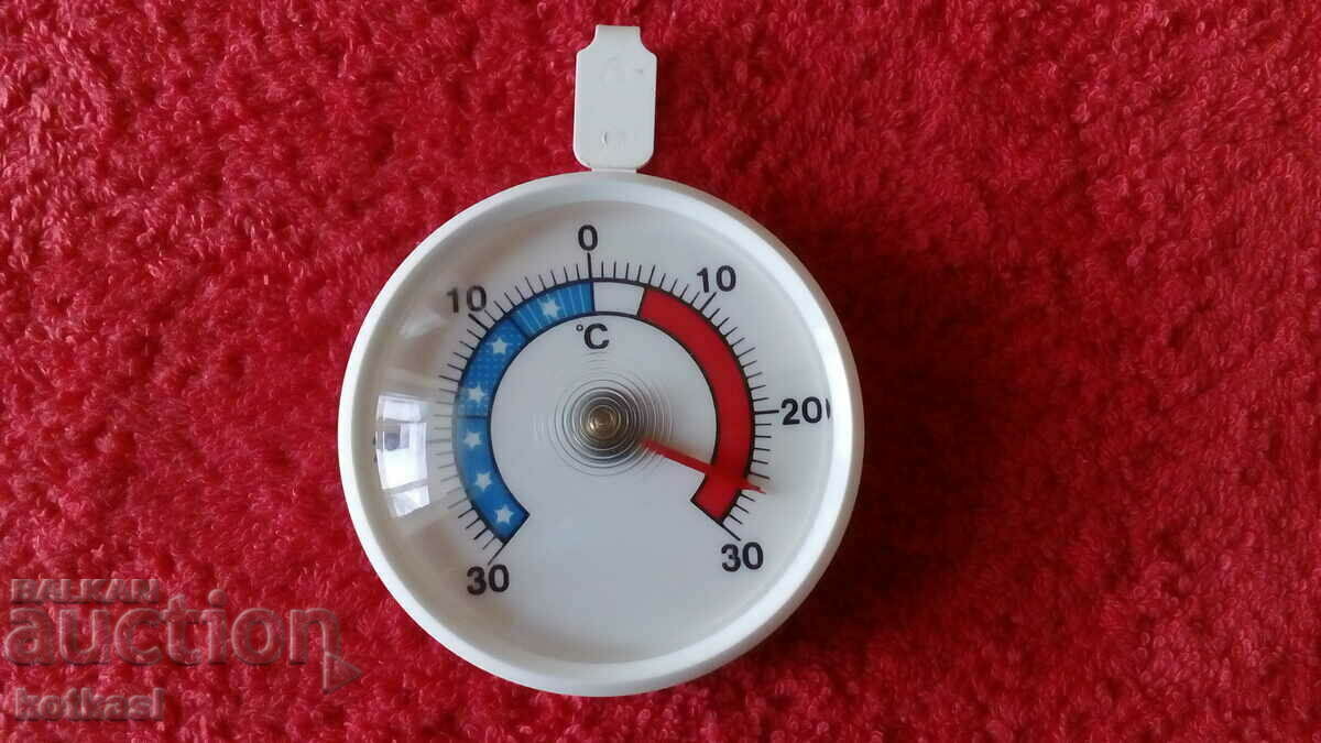 Old round thermometer