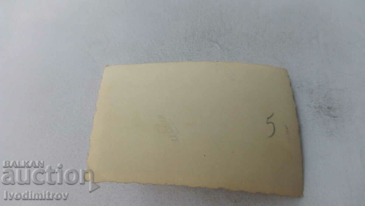 Photo A man and three women on the beach with price 1.65 BGN | € 0.84 Photo A man and three women on the beach with price 1.65 BGN | € 0.84