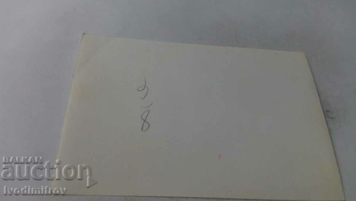 Photo of newlyweds with their friends with price 1.35 BGN | € 0.69