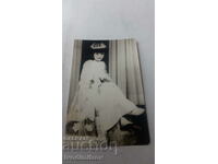 Photo Bridesmaid in a white dress