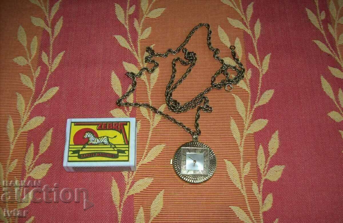 Swiss watch "BULOVA" medallion Swiss watch "BULOVA" medallion