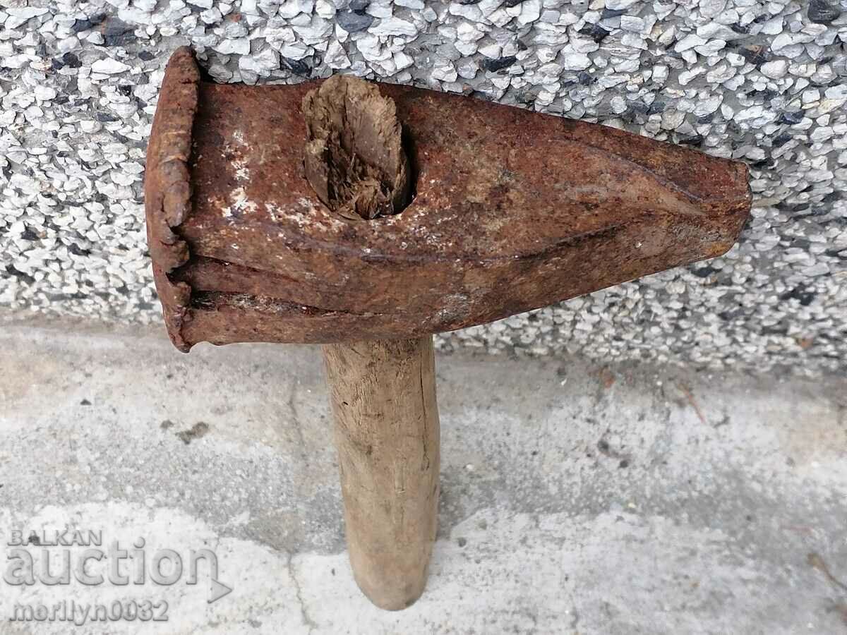 Delivery of A very old primitive hammer tool