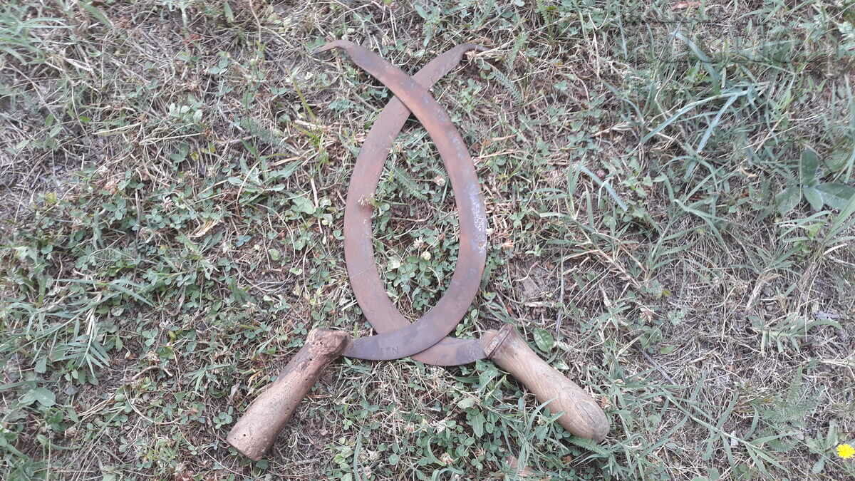 Auction two antique sickles one marked AUSTRIA Auction two antique sickles one marked AUSTRIA