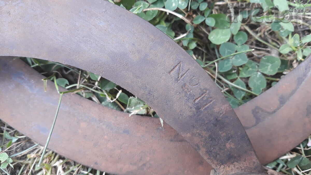 two antique sickles one marked AUSTRIA - 5 two antique sickles one marked AUSTRIA - 5