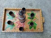 Old wooden tray with cups