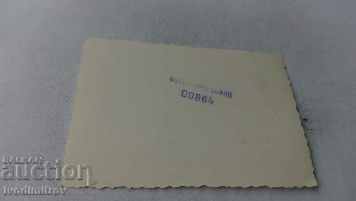 Photo A man and a boy with a rubber mattress on the beach with price 1.45 BGN | € 0.74 Photo A man and a boy with a rubber mattress on the beach with price 1.45 BGN | € 0.74